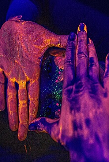 Neon painted hands